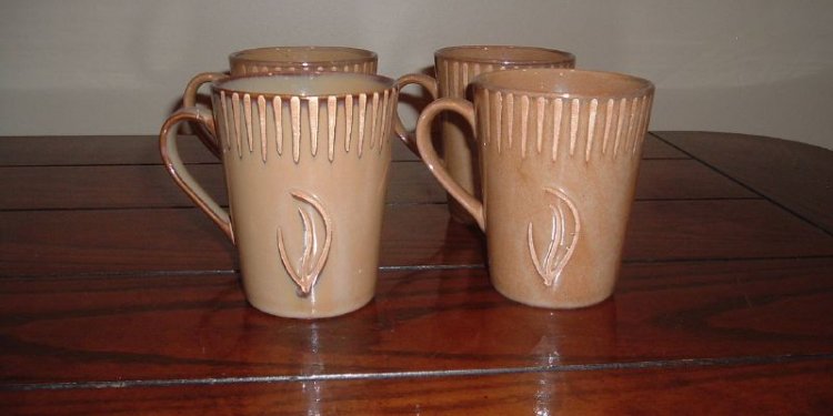 07. 4 Clay coffee mugs ($2