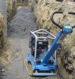 compactding soil under footing